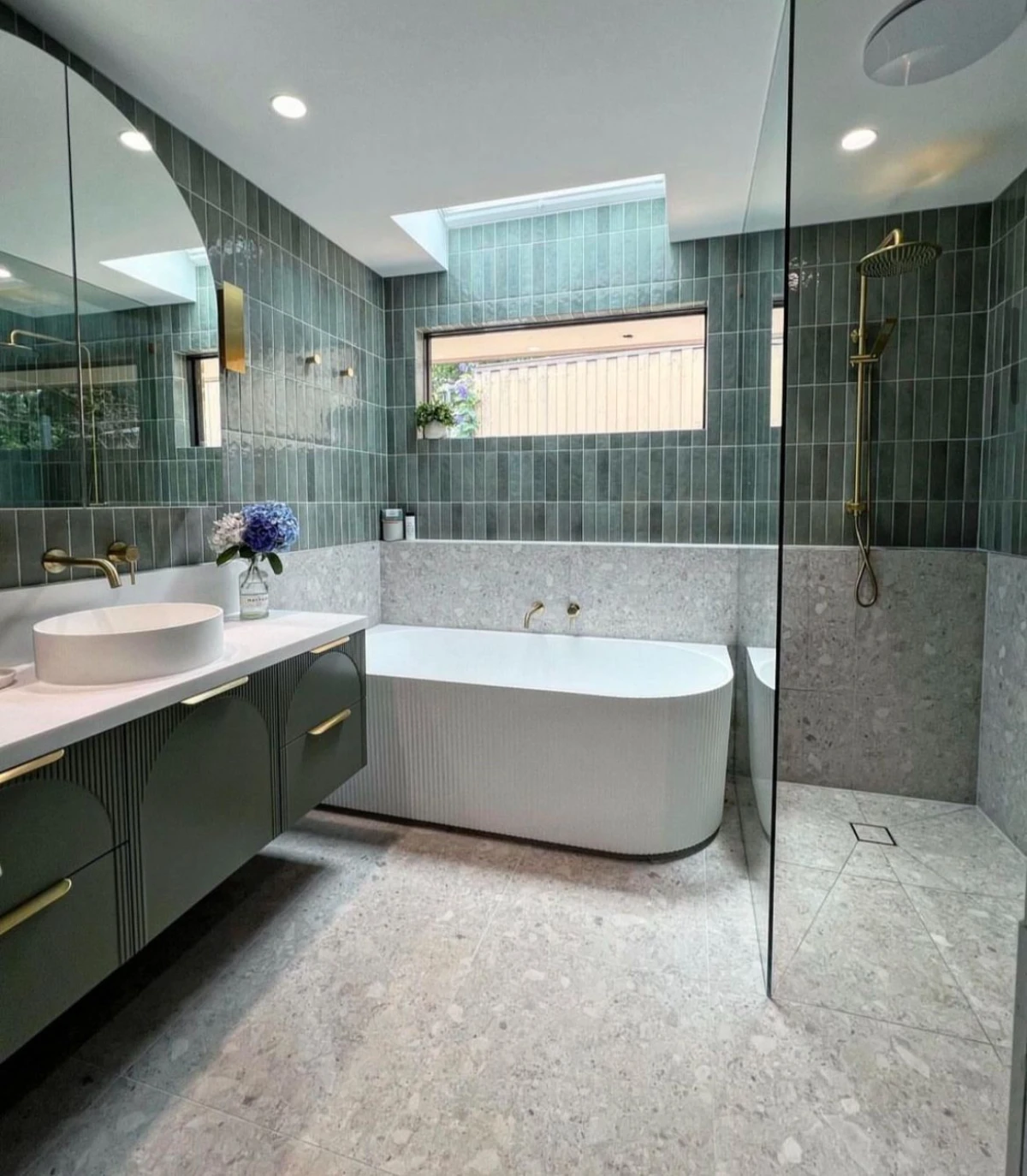 Contemporary wet room, minimalist walk-in shower, with built-in ledge