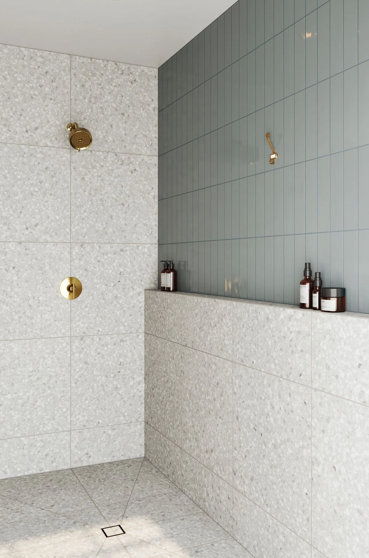 Wet room bathroom with terrazzo tiles, walk-in shower layout, and square drain